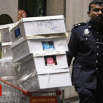 Bags and cash seized in Najib-linked raids