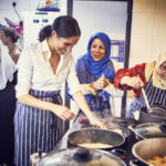 Meghan Markle Makes Secret Visits To Grenfell To Make Cookbook – And She’s In The Kitchen