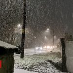 Vehicles stranded by snow and roads impassable