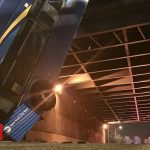 NYC bendy bus left dangling from overpass in Bronx