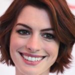 Anne Hathaway talks paid parental leave, gushes about husband