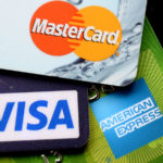 UK lenders put on brakes after borrowing binge