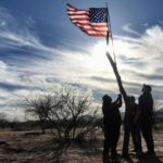 Trump backs down on border wall funding