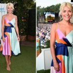 Holly Willoughby looks better than ever as she shows off her weight loss and flashes her tanned legs in a summery dress at London gig